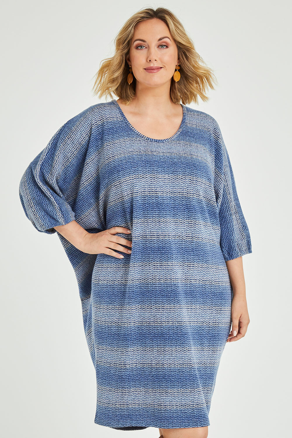 Model Jess wearing size 12 of the Belle Side Drape Stripe Dress in colour Stripe (Blue), from the front, cropped image