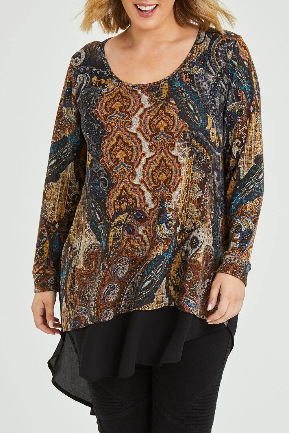 Model Jess wearing size 12 of the Belle Paisley Mixed Fabric Tunic in colour Paisley, from the front, cropped image