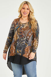 Model Katie wearing size 16 of the Belle Paisley Mixed Fabric Tunic in colour Paisley, from the front, cropped image