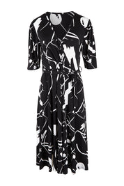 Product shot of the Belle X Over Full Skirt Dress in colour Blackwhite (Black), from the front