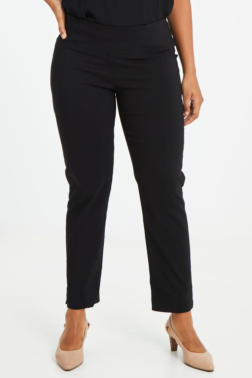 Model Noli wearing size 14 of the Belle Essential Pull On Slim Leg Pant in colour Black (Black), from the front, cropped image