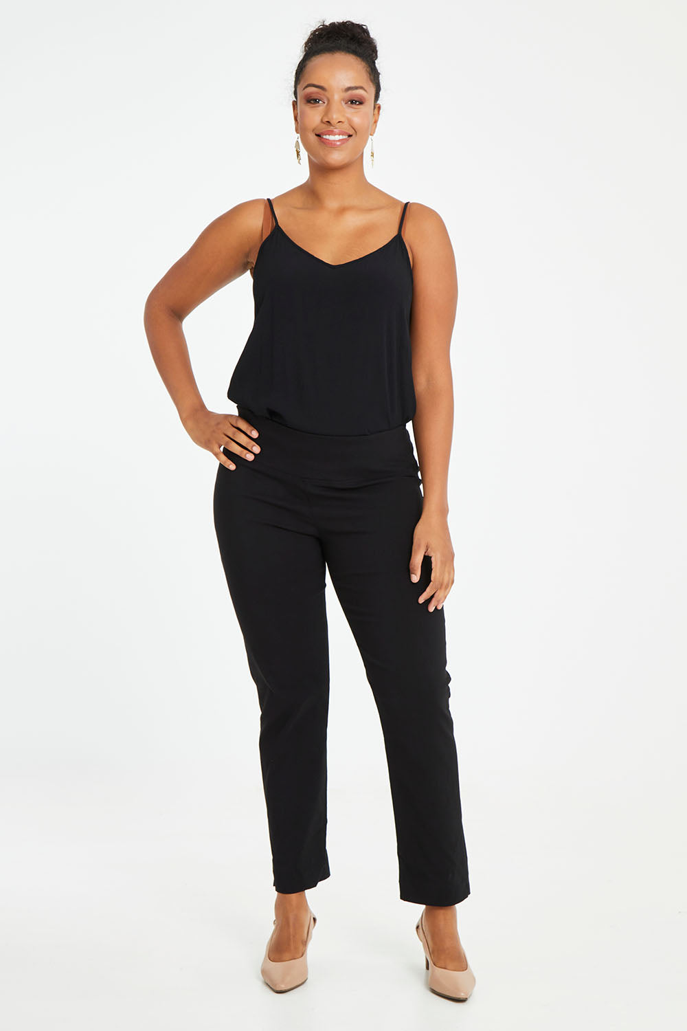 Model Noli wearing size 14 of the Belle Essential Pull On Slim Leg Pant in colour Black (Black), from the front, showing the whole outfit