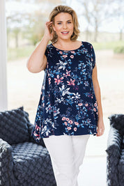 Model Fiona wearing size 16 of the Belle Printed Drape Tee in colour Floral (Blue), from the front, showing the whole outfit