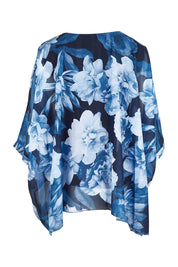 Product shot of the Belle Chiffon Overlay Top in colour Bluefloral (Blue), from the back