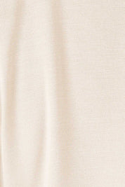 Product shot of the Belle Asymmetric Luxe Bamboo Tank in colour Straw, detail