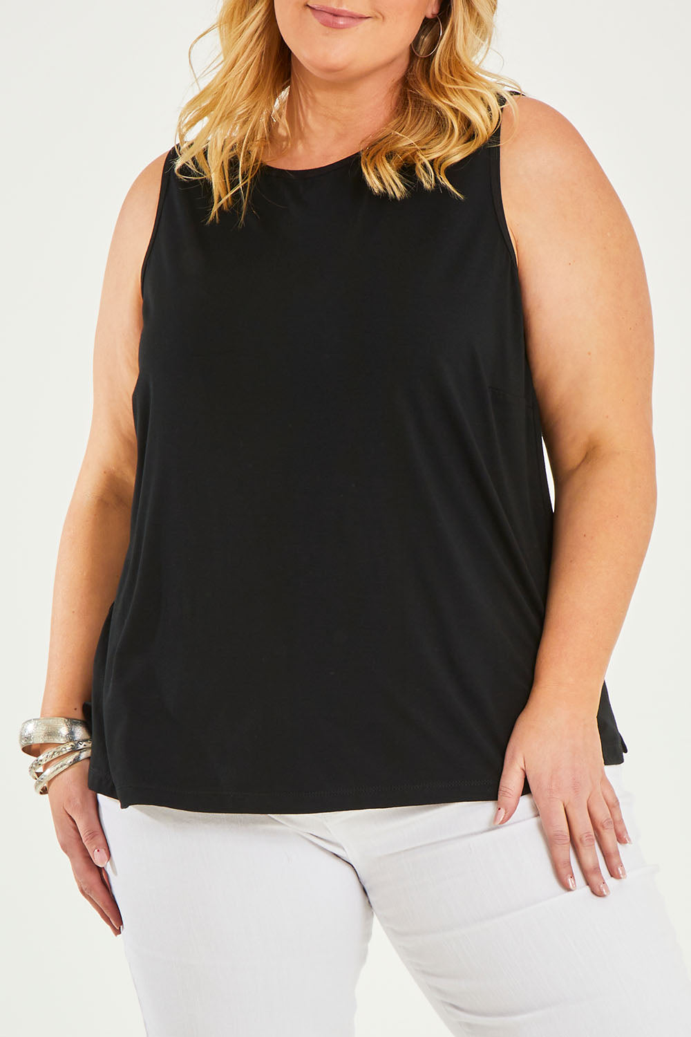 Model Caitlin wearing size 20 of the Belle Luxe Bamboo Tank in colour Black (Black), from the front, cropped image