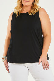 Model Caitlin wearing size 20 of the Belle Luxe Bamboo Tank in colour Black (Black), from the front, cropped image