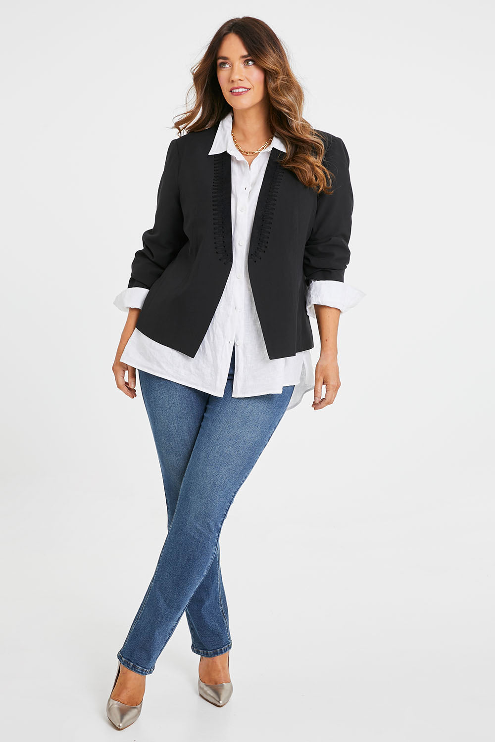 Model Laura wearing size 14 of the Belle Eyelet Detail Blazer in colour Black (Black), from the front, showing the whole outfit
