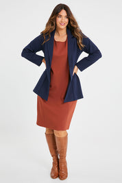 Model Laura wearing size 14 of the Belle Classic Ponte Sleeveless Dress in colour Ochrerust, from the front, showing the whole outfit
