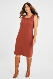 Model Laura wearing size 14 of the Belle Classic Ponte Sleeveless Dress in colour Ochrerust, from the front, showing the whole outfit