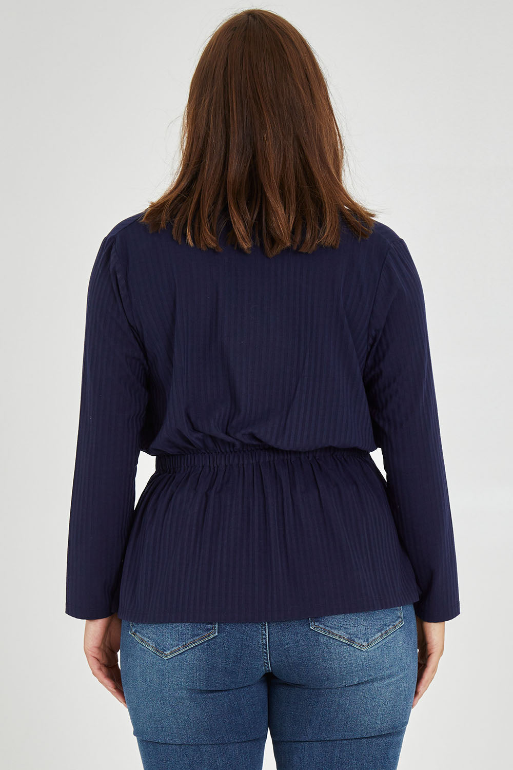 Model Monique wearing size 14 of the Belle X Over Long Sleeve Tee in colour Navy (Blue), from the back