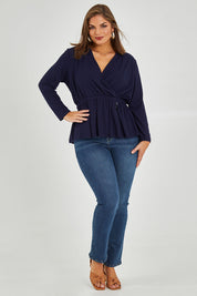 Model Monique wearing size 14 of the Belle X Over Long Sleeve Tee in colour Navy (Blue), from the front, showing the whole outfit