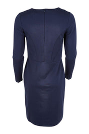 Product shot of the Belle Panelled Ponte Dress in colour Darknavy (Blue), from the back