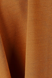 Product shot of the Belle Luxe Bamboo V Neck Tee in colour Tawny, detail