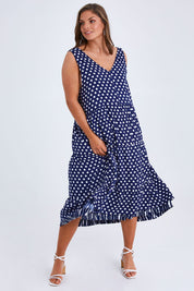 Model Monique wearing size 14 of the Belle V Neck Reversible Dress in colour Navywhite (Blue), from the front, showing the whole outfit