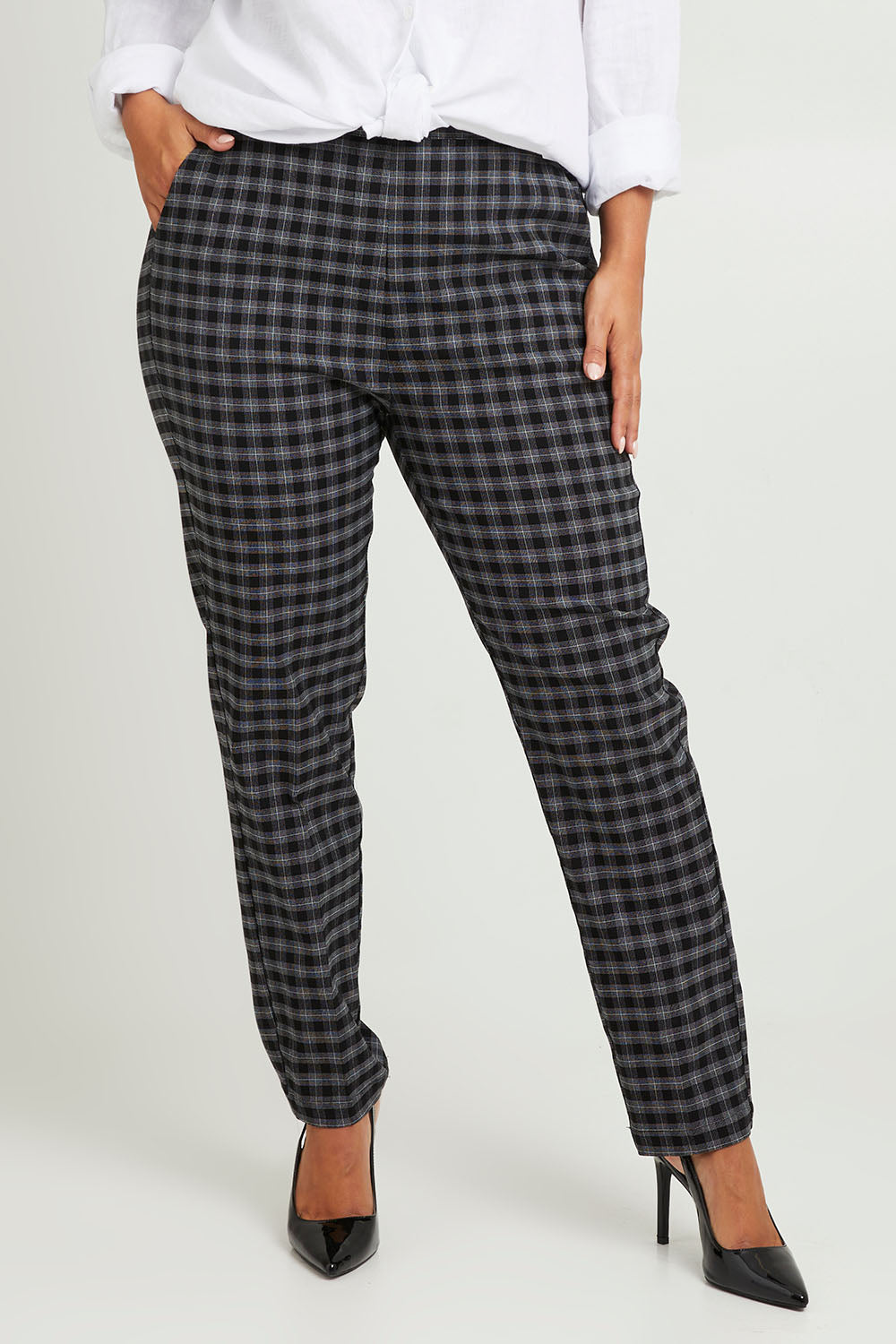 Model Monique wearing size 14 of the Belle Check Pull on Pant in colour Blackwhite (Black), from the front, cropped image