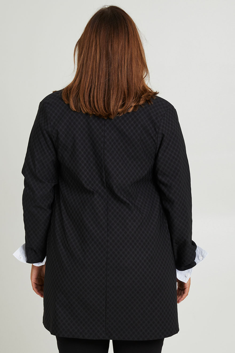 Model Monique wearing size 14 of the Belle Checked Jacket in colour Blackgrey (Black), from the back