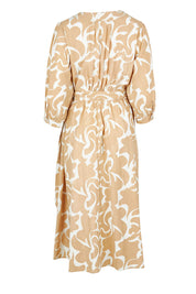 Product shot of the Belle Puff Sleeve Wrap Dress in colour Croissant, from the back