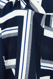 Product shot of the Belle Printed Twist Knot Detail Cotton Dress in colour Bluegeo (Blue), detail