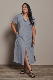 Model Ashleigh wearing size 16 of the Belle Striped Cotton Shirtmaker Dress in colour Blackwhite (Black), from the front, showing the whole outfit