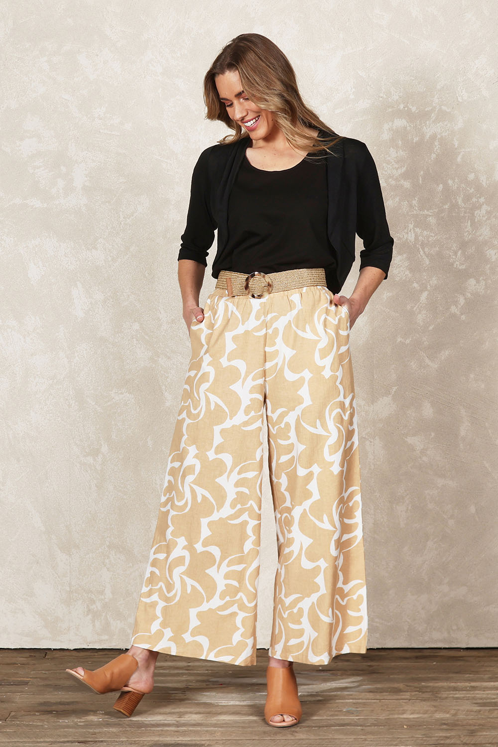 Model Olivia wearing size 10 of the Belle Printed Cotton Wide Leg Pant in colour Croissant, from the front, showing the whole outfit