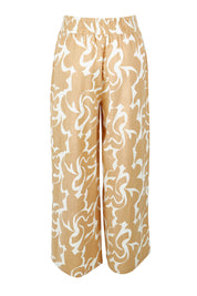 Product shot of the Belle Printed Cotton Wide Leg Pant in colour Croissant, from the back