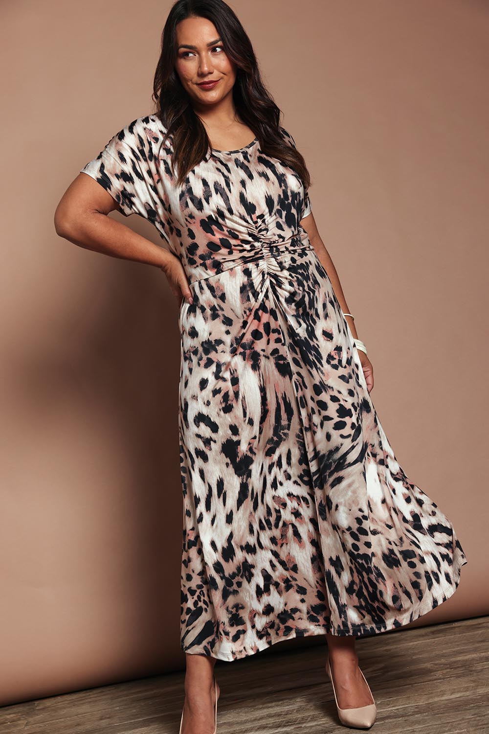 Model Ashleigh wearing size 16 of the Belle Printed Rouched Maxi Dress in colour Leopard, from the front, showing the whole outfit