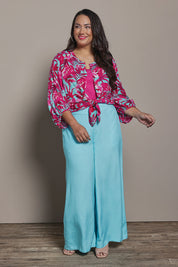 Model Ashleigh wearing size 16 of the Belle Printed Full Sleeve Shirt in colour Aquafusch (Pink), from the front, showing the whole outfit