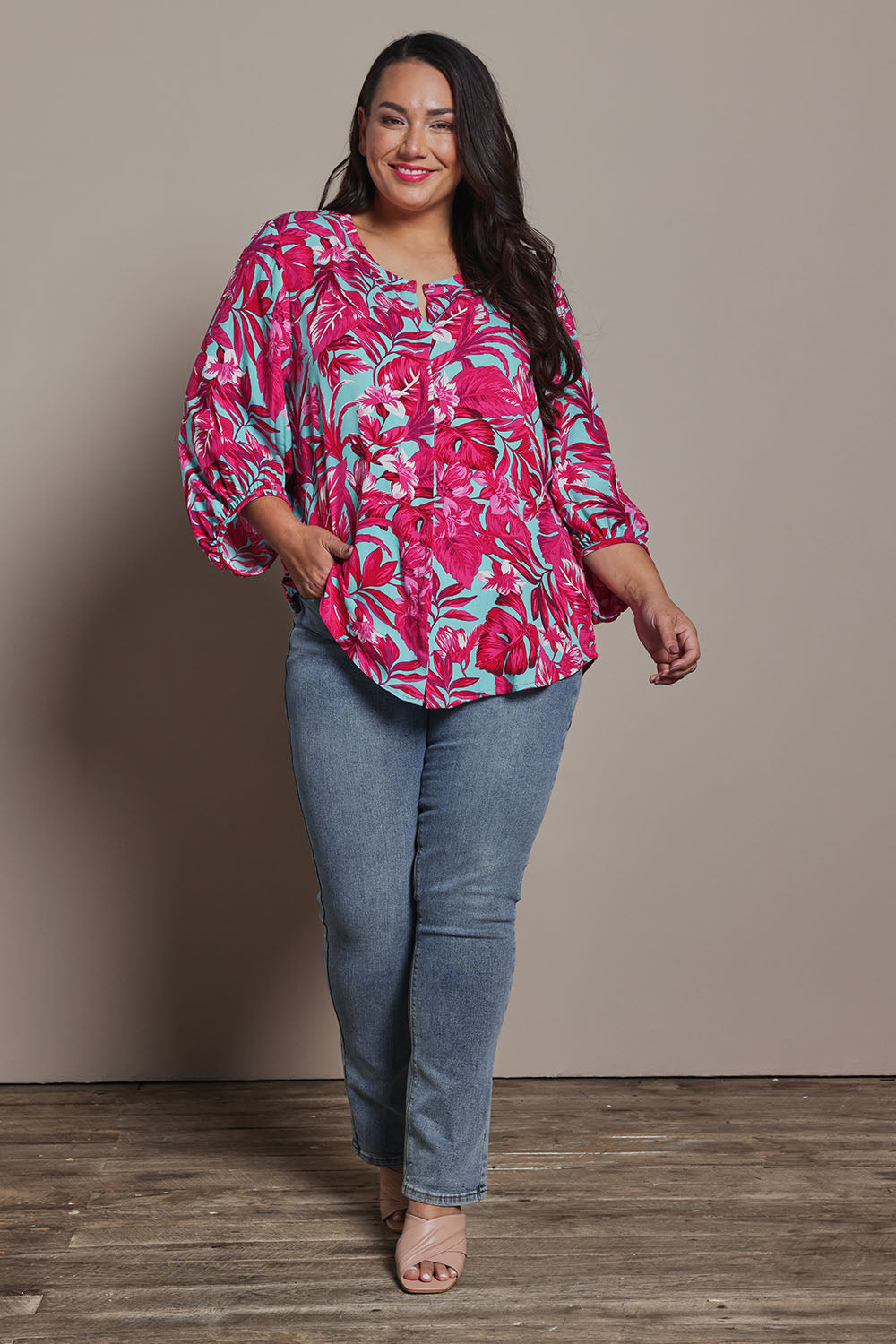 Model Ashleigh wearing size 16 of the Belle Printed Full Sleeve Shirt in colour Aquafusch (Pink), from the front, showing the whole outfit