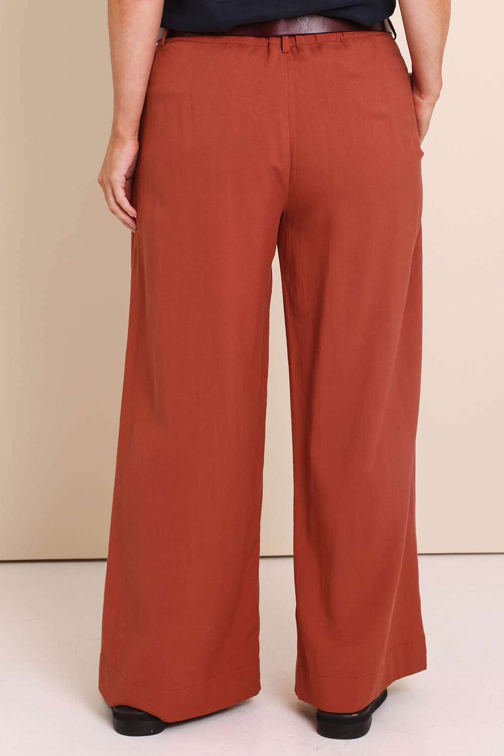 Model Lauraw wearing size 14 of the Belle Wear Anywhere Pants  - Sienna in colour Sienna, from the front
