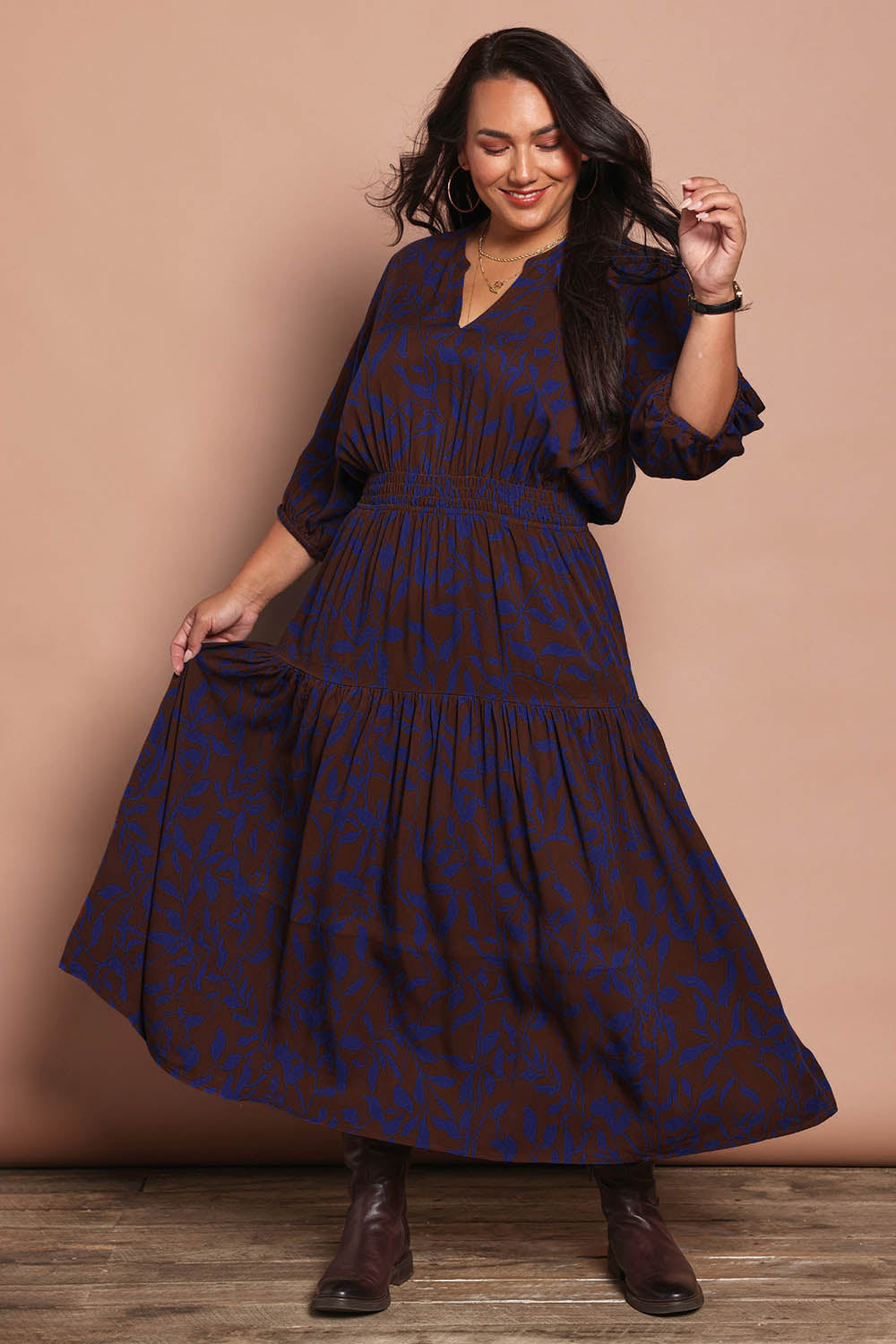 Model Ashleigh wearing size 16 of the Belle Luxe Ecovero Printed Tiered Dress in colour Cobaltcoco (Blue), from the front, showing the whole outfit