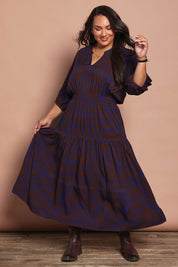 Model Ashleigh wearing size 16 of the Belle Luxe Ecovero Printed Tiered Dress in colour Cobaltcoco (Blue), from the front, showing the whole outfit
