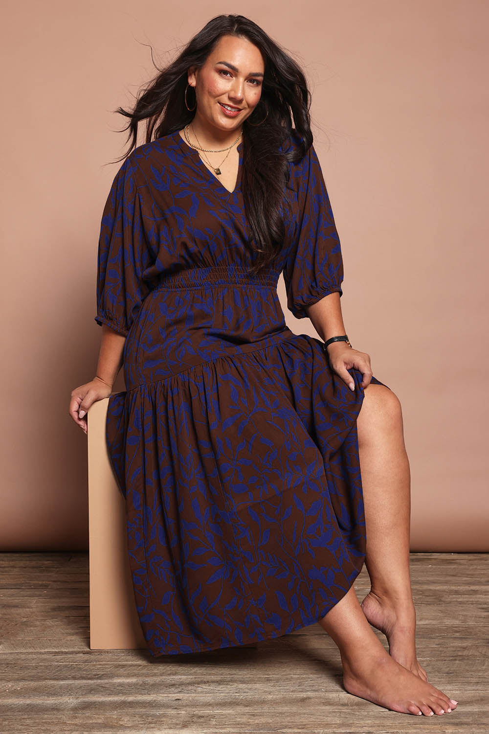 Model Ashleigh wearing size 16 of the Belle Luxe Ecovero Printed Tiered Dress in colour Cobaltcoco (Blue), from the front, showing the whole outfit