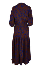 Product shot of the Belle Luxe Ecovero Printed Tiered Dress in colour Cobaltcoco (Blue), from the back