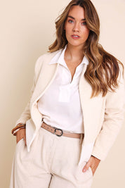 Model Lauraw wearing size 14 of the Belle Cotton Colour Blocked Blazer – Creamivory in colour Creamivory, in a cropped view