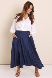 Model Lauraw wearing size 14 of the Belle Easy Wear Every Wear  Skirt  - Navy in colour Navy, from the front
