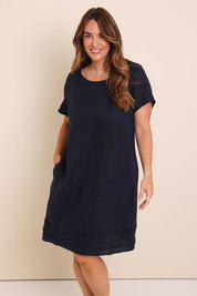 Model Lauraw wearing size 14 of the Belle Easy Wear Linen Panelled Dress – Navy in colour Navy, in a cropped view