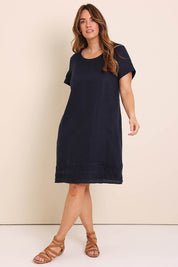 Model Lauraw wearing size 14 of the Belle Easy Wear Linen Panelled Dress – Navy in colour Navy, from the front