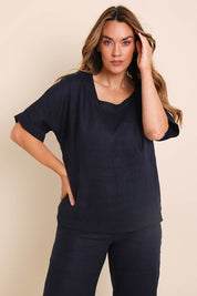 Model Lauraw wearing size 14 of the Belle Easy Wear Linen Scoop Tee – Navy in colour Navy, in a cropped view