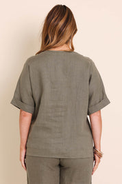 Model Lauraw wearing size 14 of the Belle Easy Wear Linen Scoop Tee – Olive in colour Olive, from the back