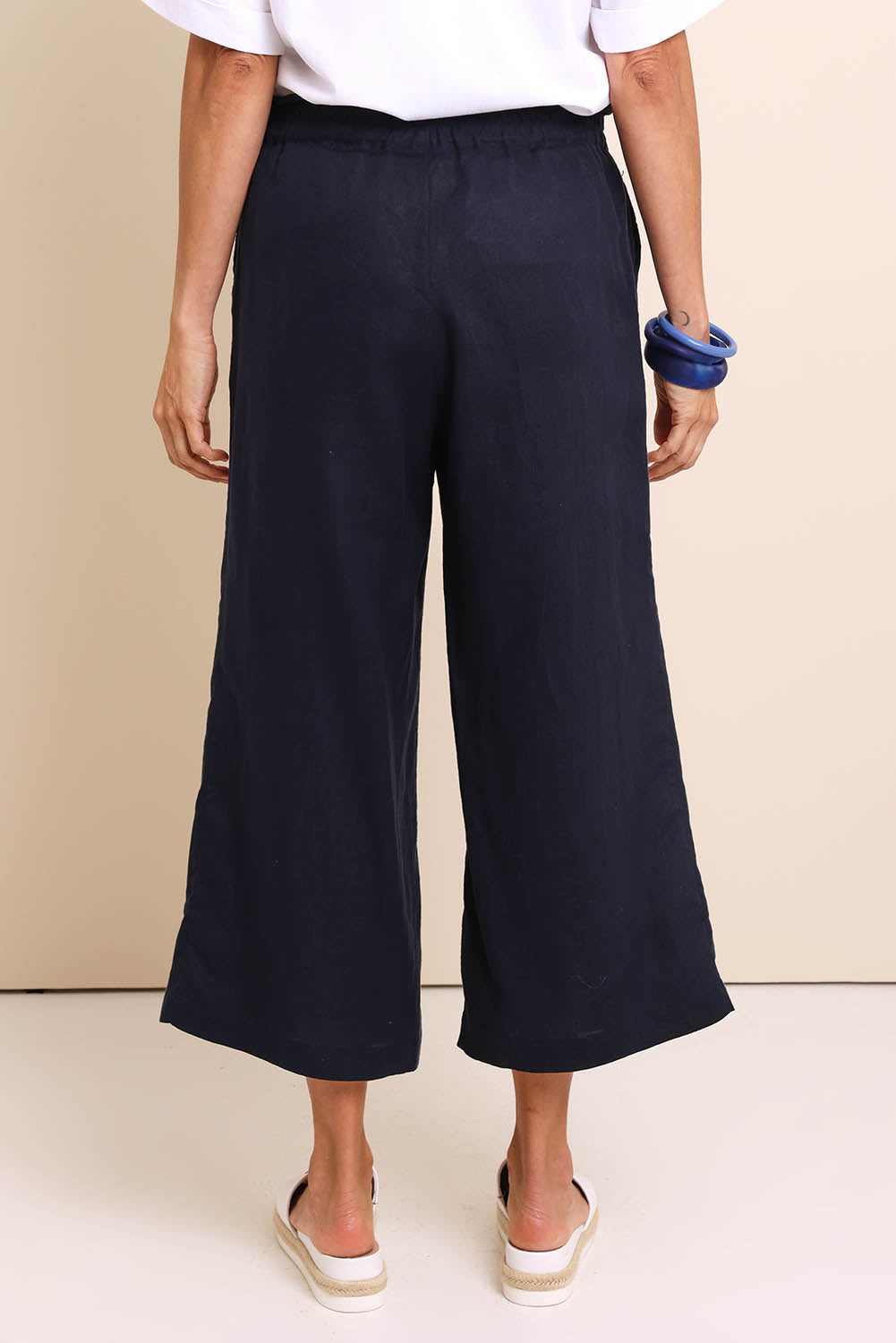Model Amandam wearing size 10 of the Belle Easy Wear Linen Pant – Navy in colour Navy, from the front