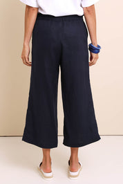 Model Amandam wearing size 10 of the Belle Easy Wear Linen Pant – Navy in colour Navy, from the front