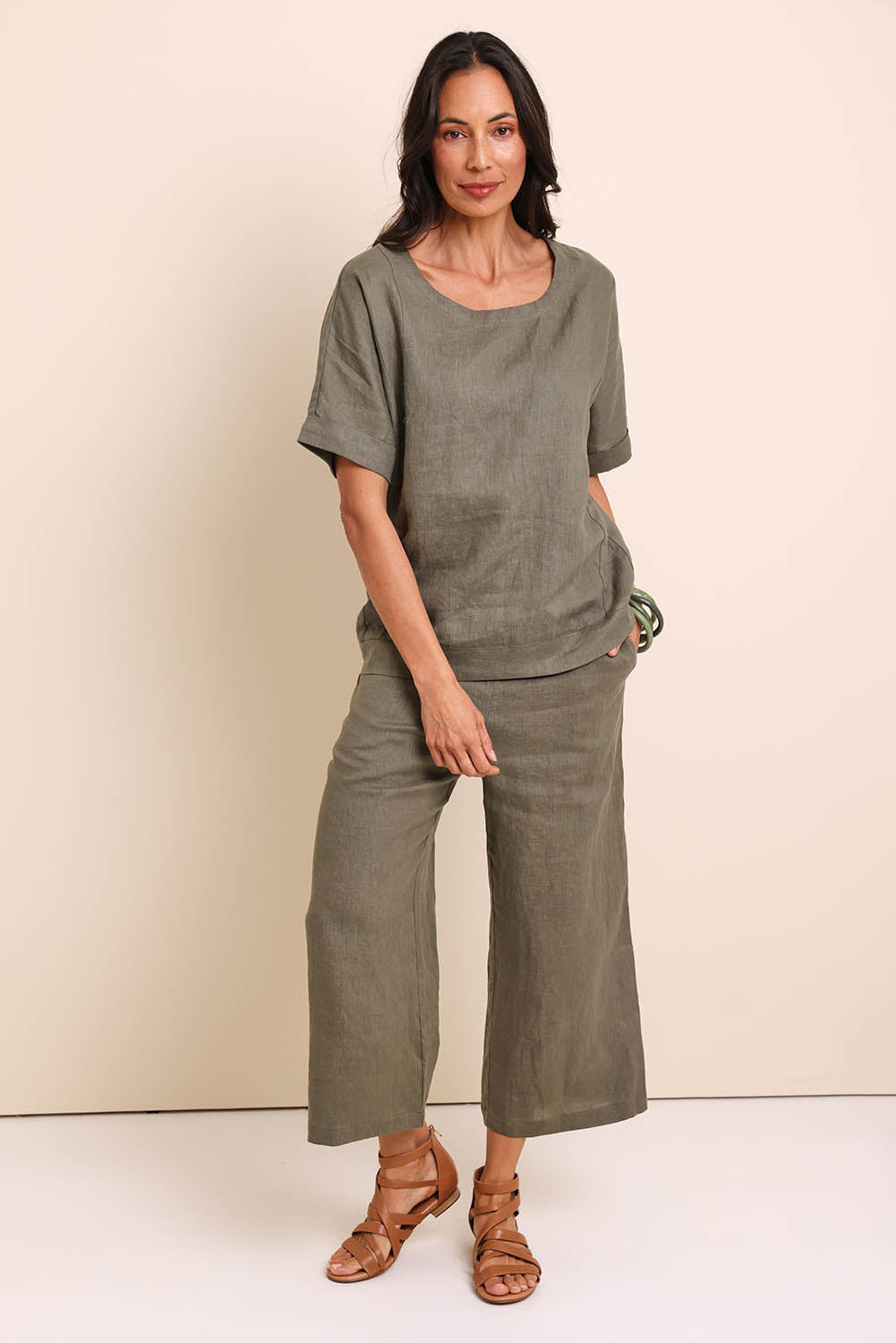 Model Amandam wearing size 10 of the Belle Easy Wear Linen Pant – Olive in colour Olive, from the front