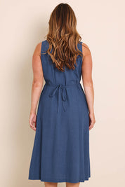 Model Lauraw wearing size 14 of the Belle Pintucked Midi Dress with Pockets - Sea blue in colour Sea Blue, from the front