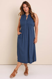 Model Lauraw wearing size 14 of the Belle Pintucked Midi Dress with Pockets - Sea blue in colour Sea Blue, from the front