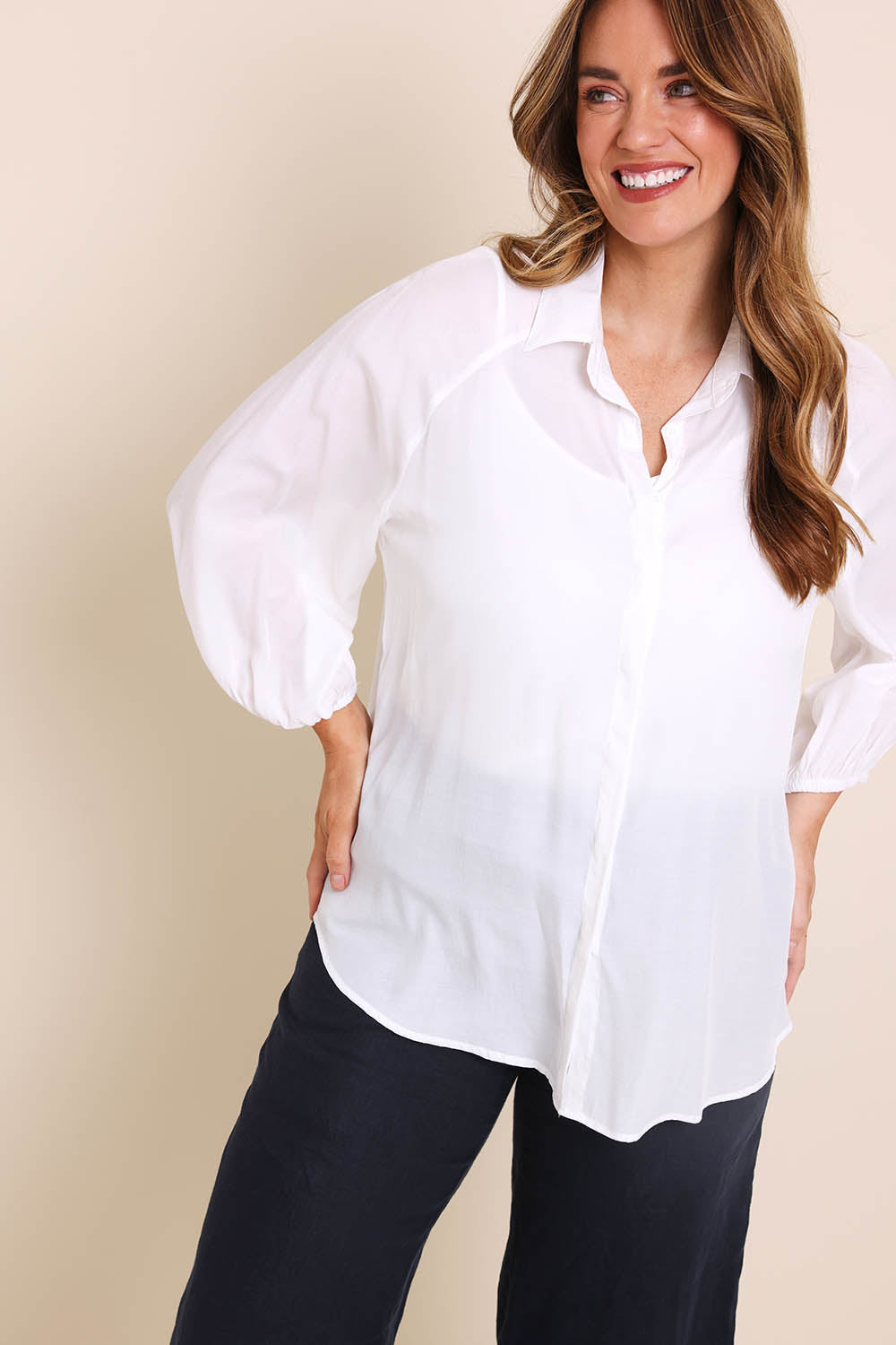 Model Lauraw wearing size 14 of the Belle Easy Wear Every Wear Shirt  - White in colour White, from an angle