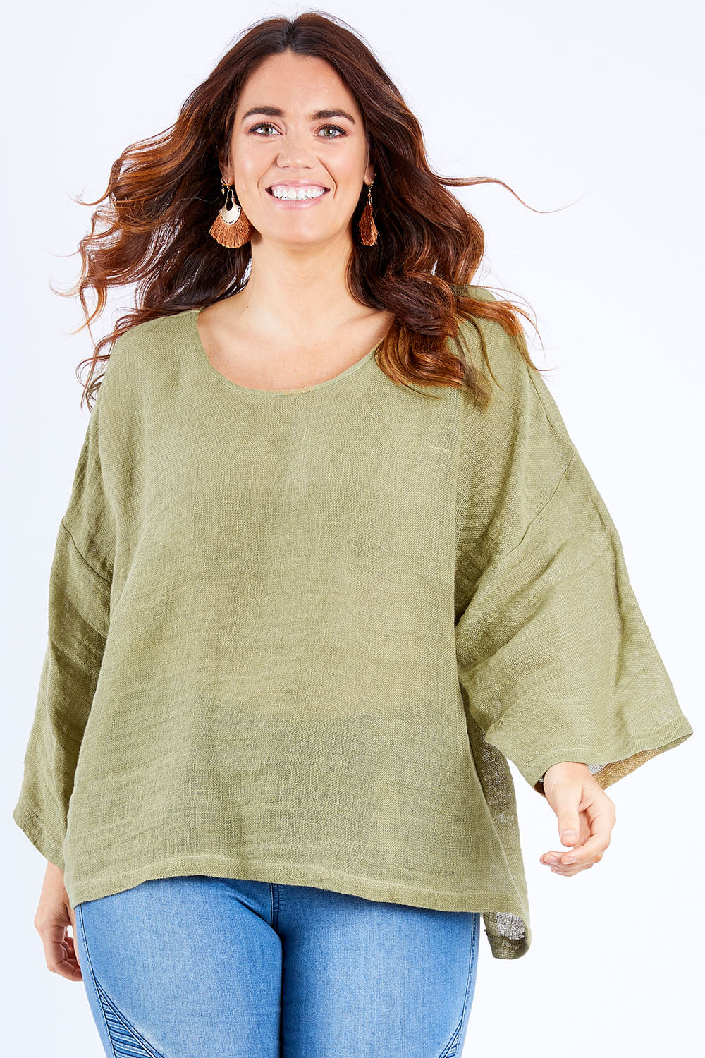 Model Laura wearing size 14 of the Sheer Delight Linen Knit Throw Top in colour Olive (Green), from the front, cropped image