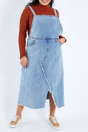 Model Sasha-Lee wearing size 16 of the Happy Me Denim Pinny in colour Denim (Blue), from the front, cropped image