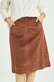 Model Jess wearing size 14 of the Ready For You Cord Skirt in colour Wild, from the front, cropped image