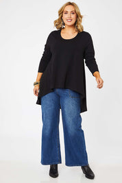 Model Jess wearing size 14 of the Sunshine In Me Long Sleeve Tee in colour Black (Black), from the front, showing the whole outfit